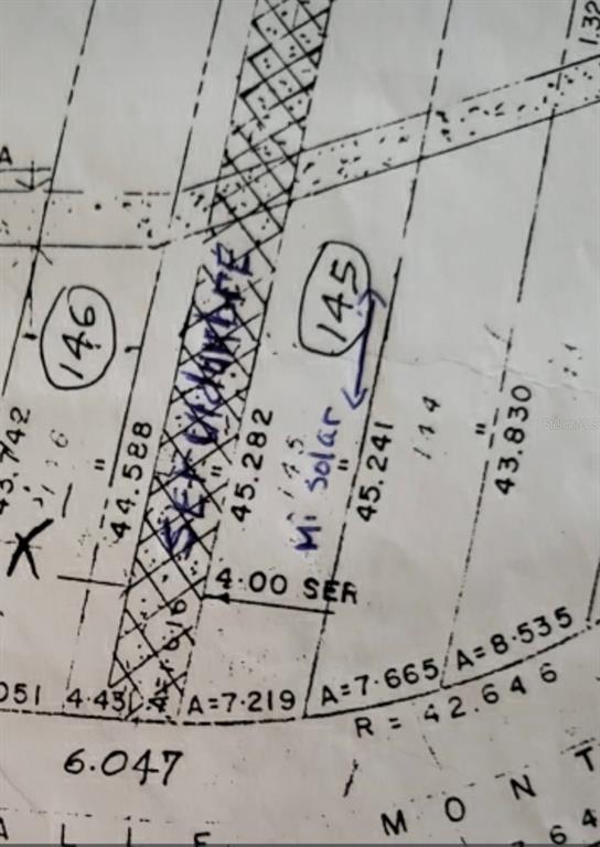 This is a close-up section of a land survey map showing lot boundaries and dimensions — 145 MONTECARLO, HUMACAO, PR