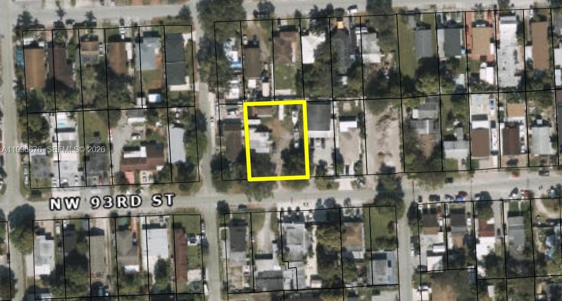 This is an aerial map view showing a highlighted residential property lot on a street — 3035 NW 93rd St, Miami FL 33147, MIAMI, FL