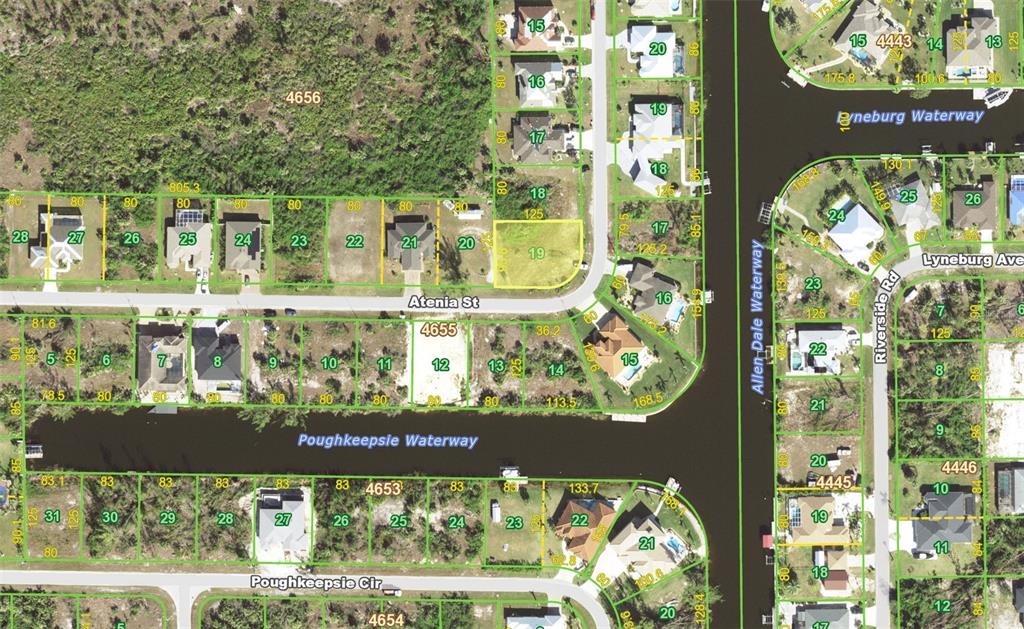 This is a satellite map showing residential lots, streets, and waterways in a suburban neighborhood — 10421 ATENIA STREET, PORT CHARLOTTE, FL