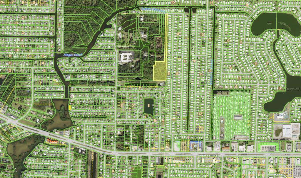 This is an aerial map showing a residential neighborhood with a highlighted vacant lot — 1139 DRURY LANE, ENGLEWOOD, FL