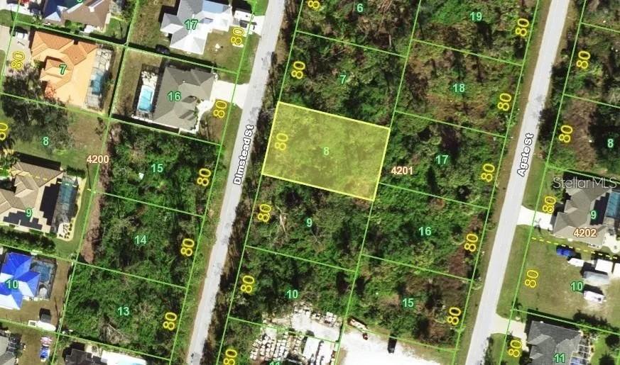 This is an aerial map showing a highlighted vacant lot between two residential streets — 8082 DIMSTEAD STREET, PORT CHARLOTTE, FL