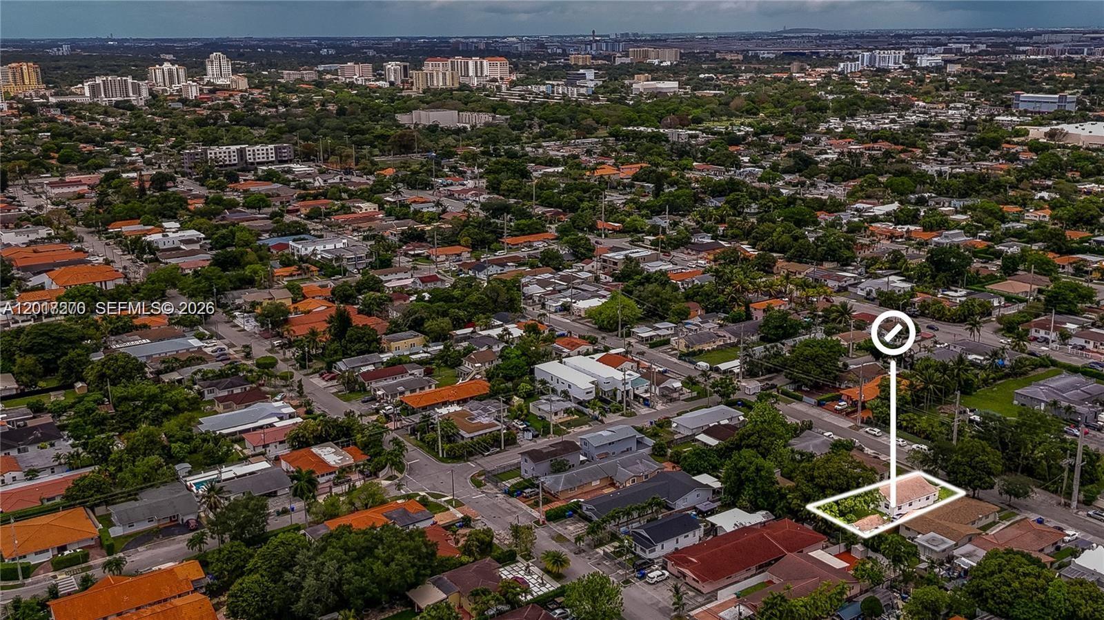 An aerial view shows a single-story house highlighted in a residential neighborhood with many trees — 2800 SW 16th Ter, Miami FL 33145, MIAMI, FL