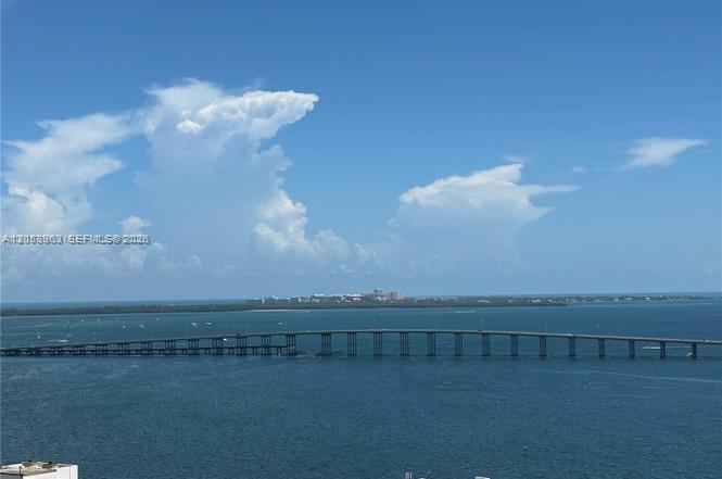 An elevated view of a long bridge spanning across a large body of water — 170 SE 14th St # 2604, Miami FL 33131, MIAMI, FL