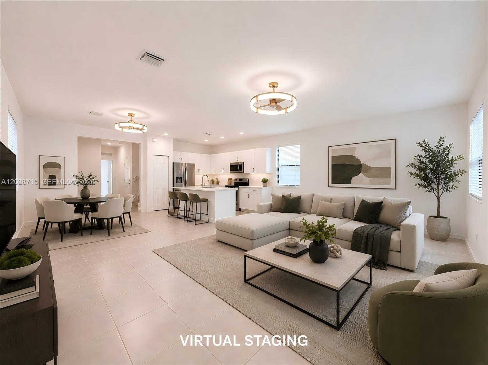 This is a virtually staged open-concept living room and kitchen with white cabinetry and tile flooring — 3448 W 110th Ter, Hialeah FL 33018, HIALEAH, FL