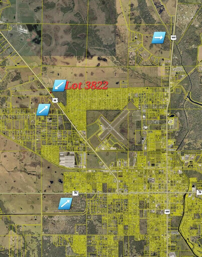 An aerial map shows a highlighted land parcel labeled Lot 3822 near a regional airport — 3822 Hwy 98 N, Okeechobee FL 34972, OKEECHOBEE, FL