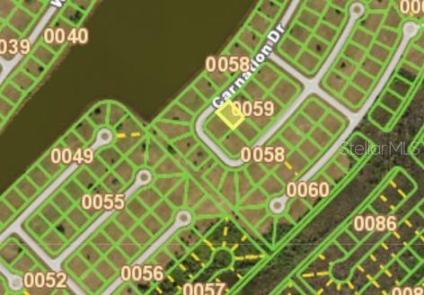 This is a map showing a highlighted residential lot located on a street corner — 28 CARNATION DRIVE, PLACIDA, FL