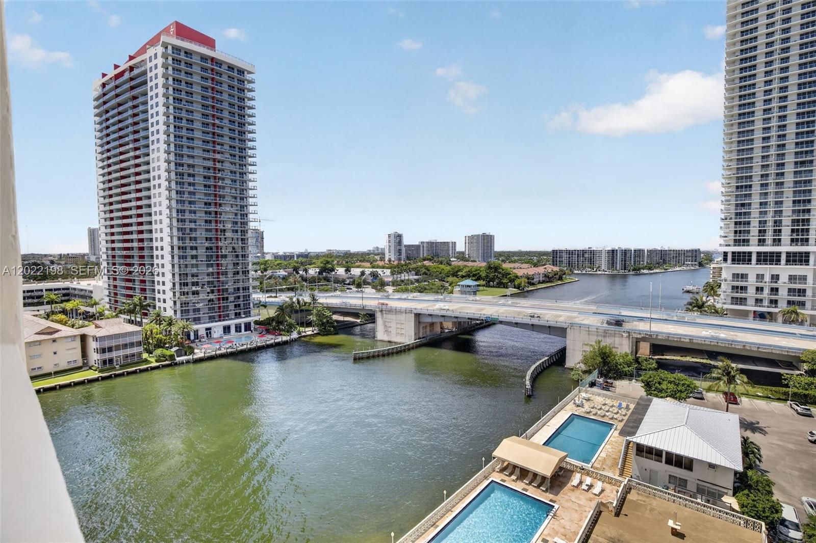 An elevated view of a waterway, a bridge, and two high-rise apartment buildings — 1817 S Ocean Dr # 19, Hallandale Beach FL 33009, HALLANDALE BEACH, FL