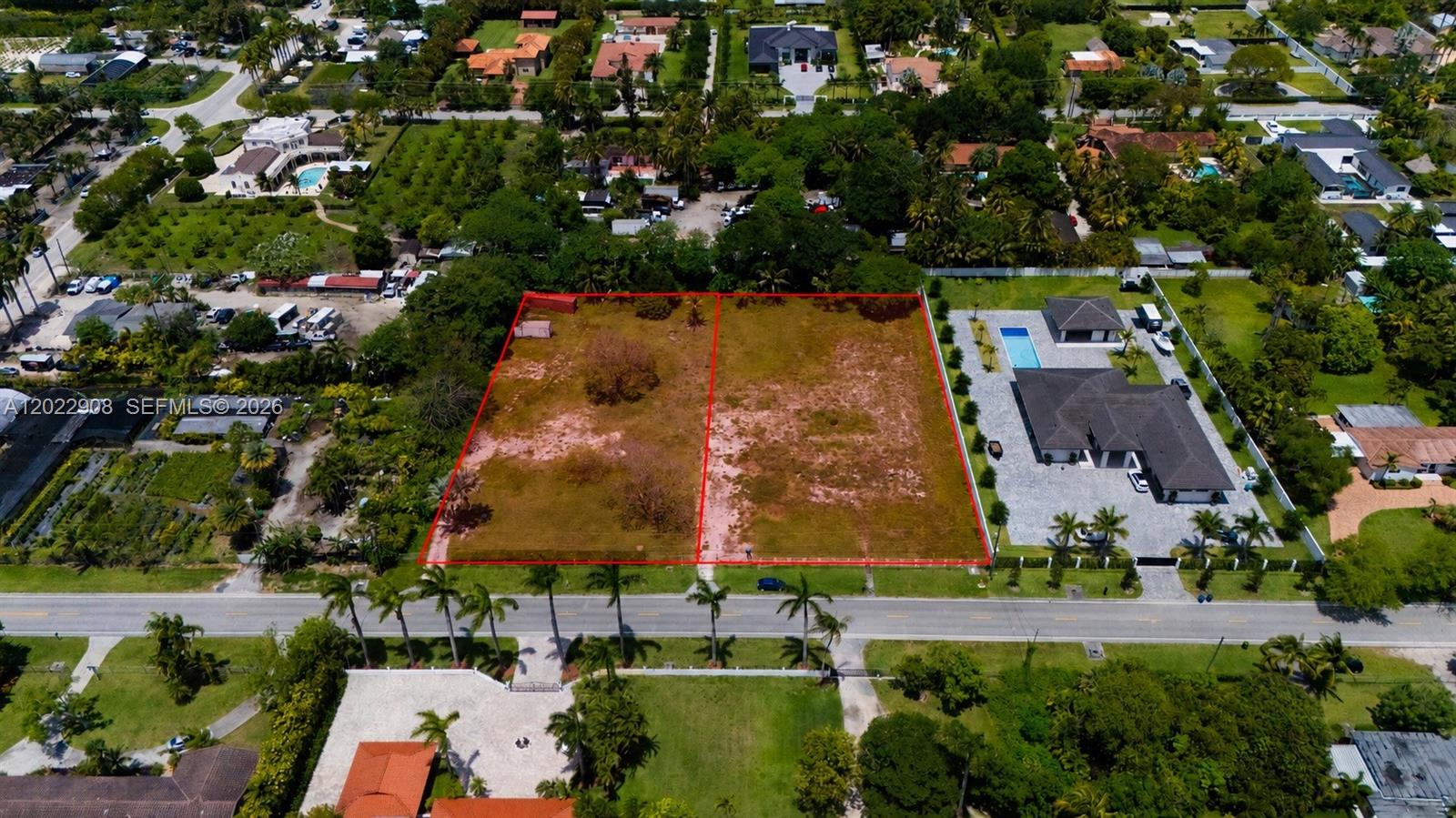 An aerial view shows two adjacent vacant rectangular lots bordered by a road and houses — 12085 SW 47th St, Miami FL 33175, MIAMI, FL