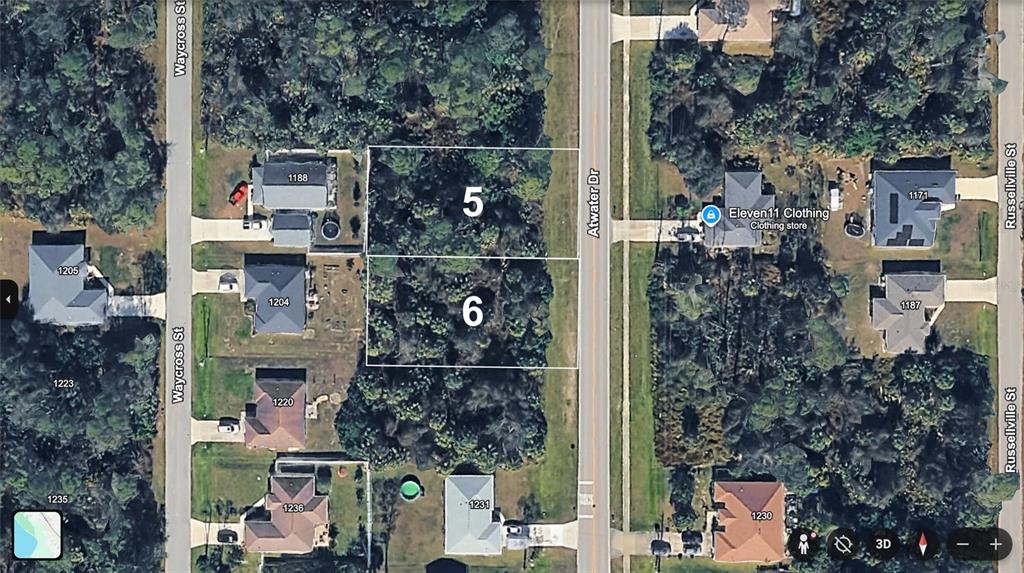 This aerial map shows two adjacent vacant lots labeled 5 and 6 along a road — ATWATER DRIVE, NORTH PORT, FL