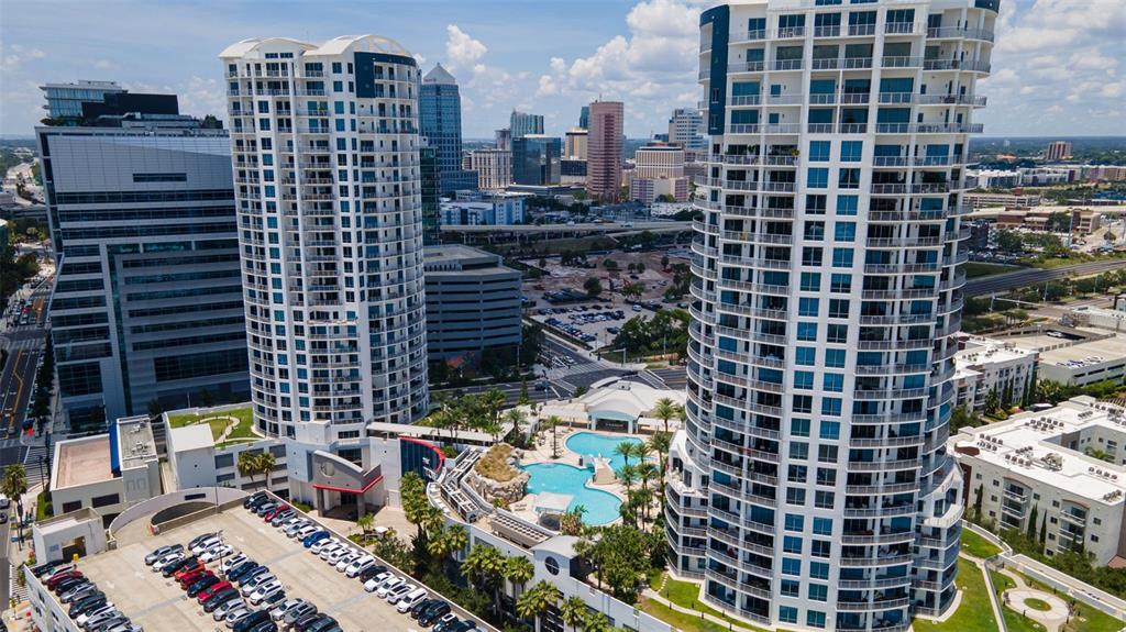 An aerial view shows two tall residential towers with a swimming pool between them — 449 S 12TH STREET UNIT 2701, TAMPA, FL
