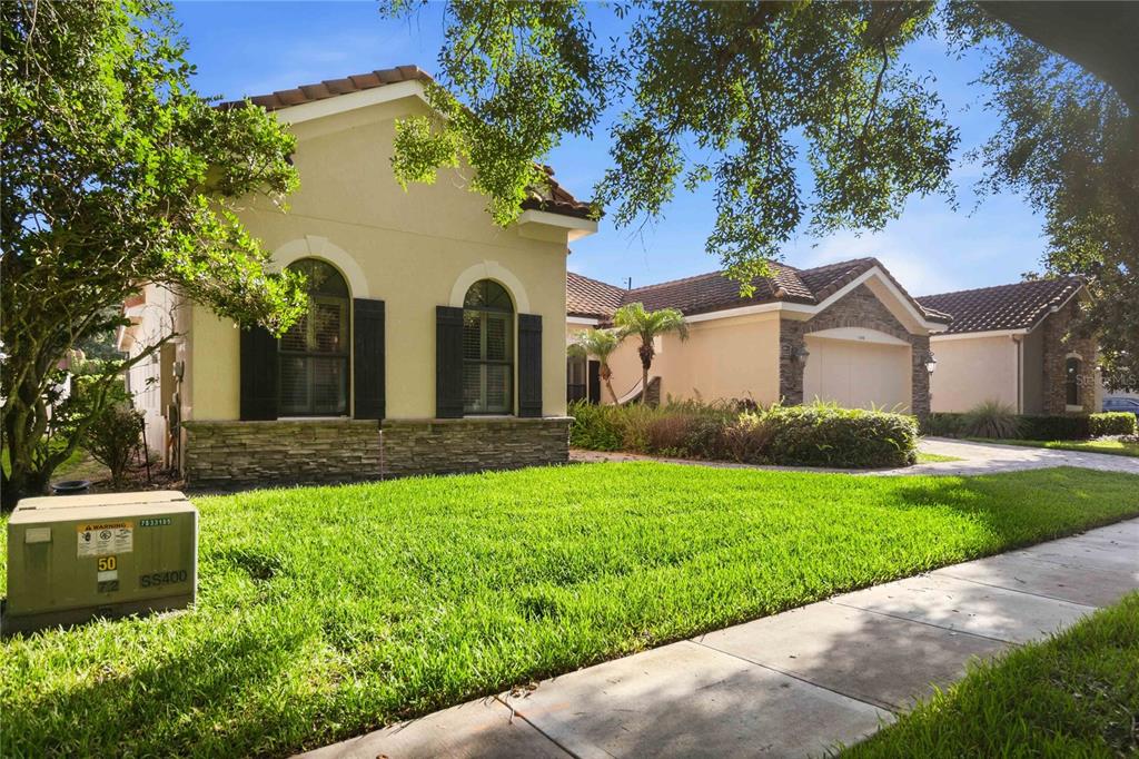 An aerial view shows a suburban house with a swimming pool and a red location pin — 1298 BELLA VISTA CIRCLE, LONGWOOD, FL