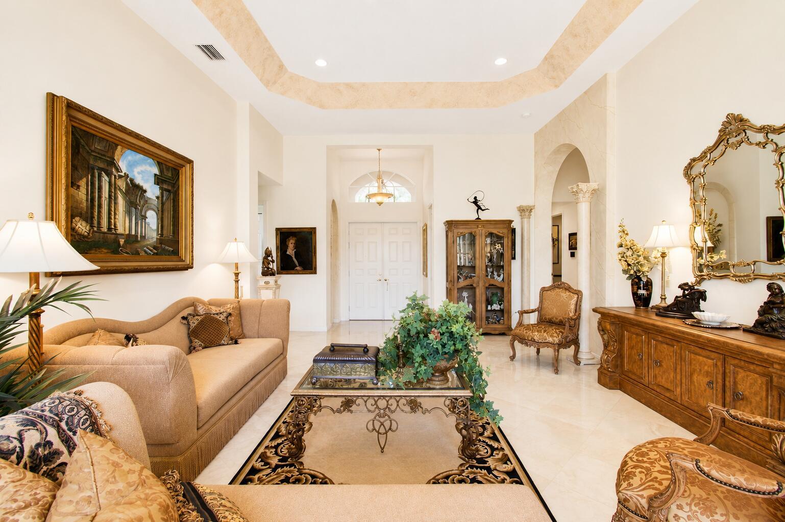 A formal living room features a coffered ceiling, marble floors, and ornate traditional furniture — 6850 Fiji Circle, Boynton Beach FL 33437, BOYNTON BEACH, FL