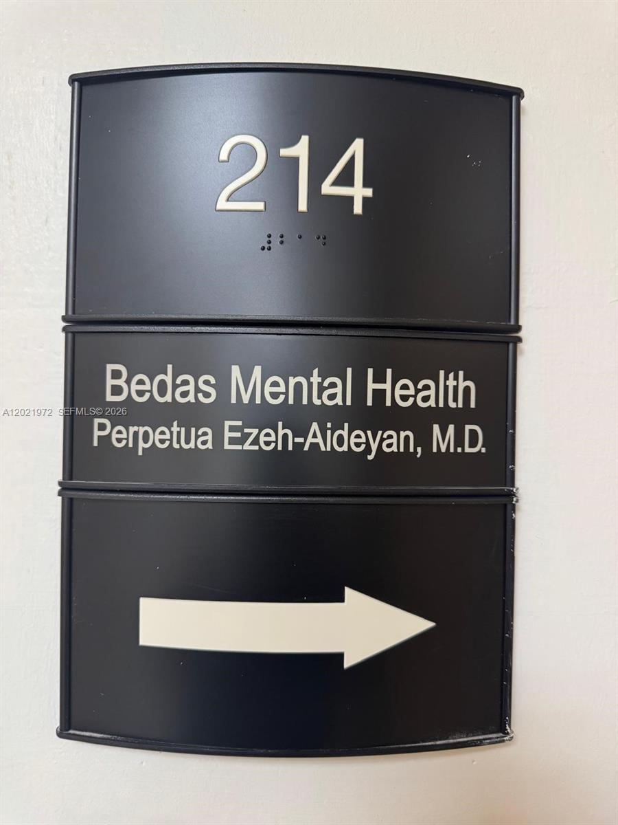 A black office sign for Bedas Mental Health and Perpetua Ezeh-Aideyan, M.D. in room 214 — 7100 W 20th Ave # 214, Hialeah FL 33016, HIALEAH, FL