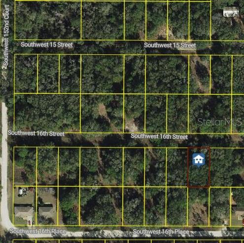 This is an aerial map showing a vacant residential lot highlighted with a house icon — SW 16TH STREET, OCALA, FL