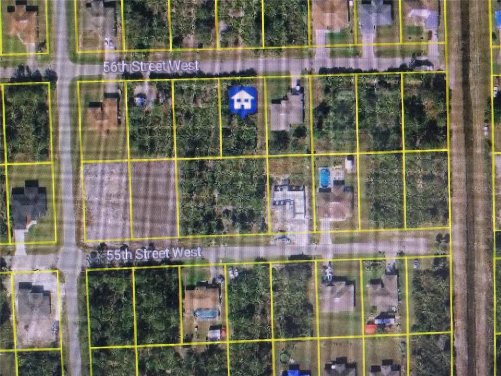 This is an aerial map view showing residential lots between 55th Street West and 56th Street — 3109 56TH STREET W, LEHIGH ACRES, FL