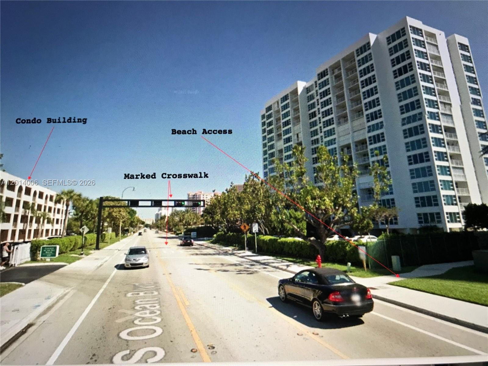 A street view shows a multi-story condo building, a marked crosswalk, and beach access — LAUDERDALE BY THE SEA, FL