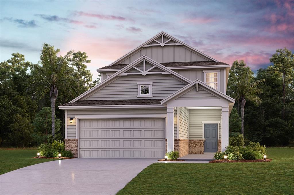 A digital rendering of a two-story suburban house with a two-car garage and brick accents — 1347 RIBBON PLACE, PALM COAST, FL