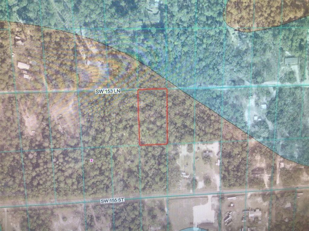An aerial map shows a rectangular plot of land outlined in red near two streets — 0 SW 153 LANE, DUNNELLON, FL