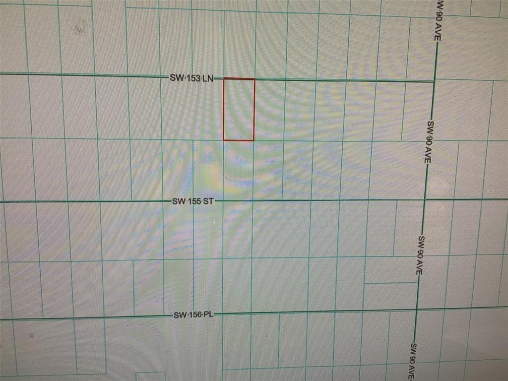 This is a map showing a rectangular property parcel outlined in red — 0 SW 153 LANE, DUNNELLON, FL