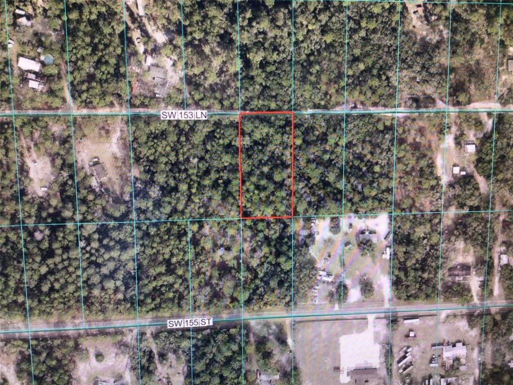 An aerial map view shows a rectangular plot of land outlined in red — 0 SW 153 LANE, DUNNELLON, FL