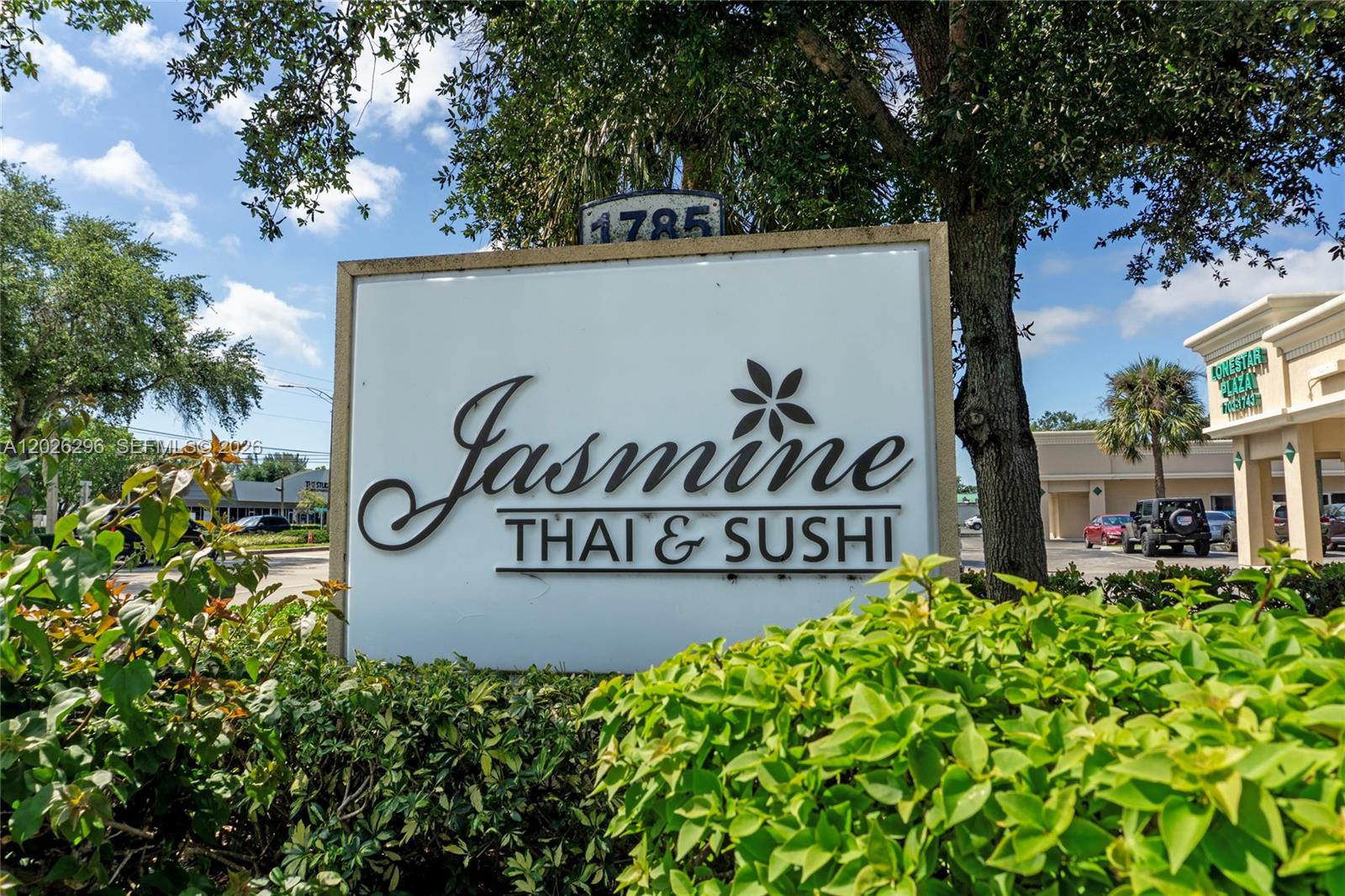 A sign for Jasmine Thai & Sushi stands in front of a commercial plaza — 1785 N State Road 7, Margate FL 33063, MARGATE, FL