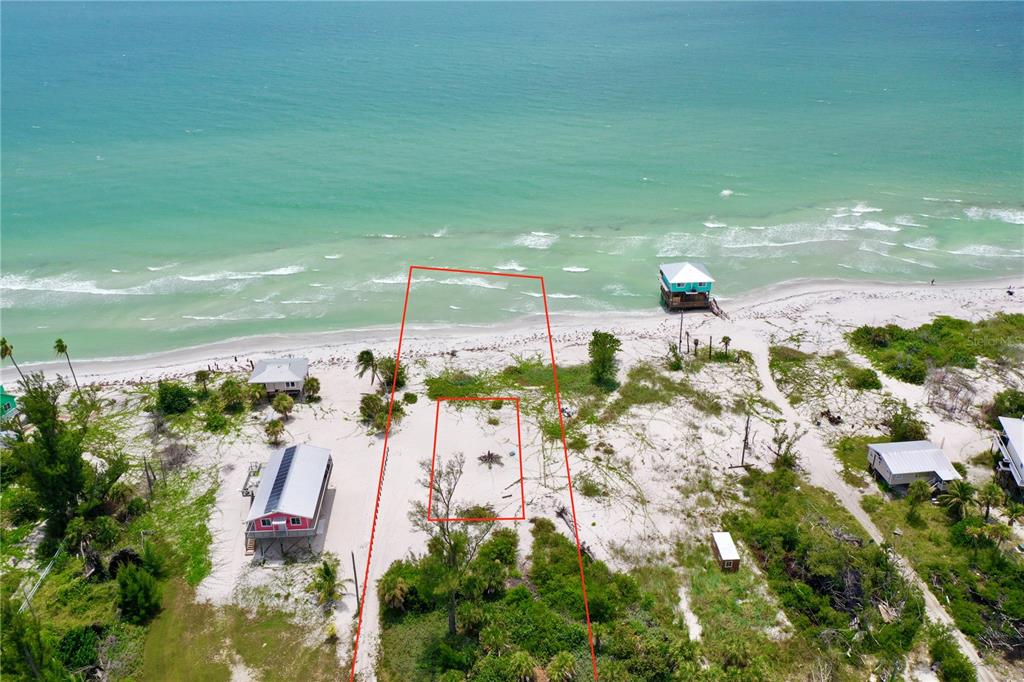 An aerial view shows a sandy beachfront lot outlined in red along the ocean — 8164, 8168, 8158, 8156 LITTLE GASPARILLA ISLAND, PLACIDA, FL