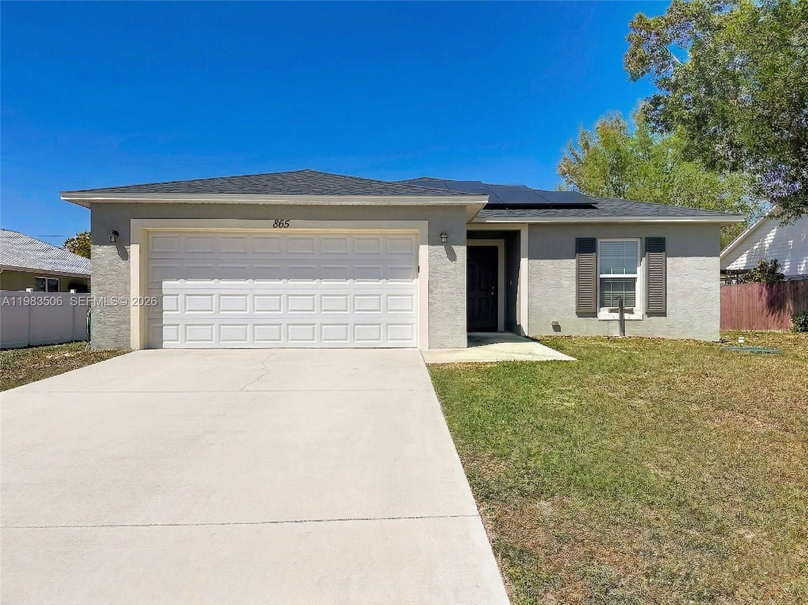 865 SW Mccracken Ave, Port St. Lucie FL 34953