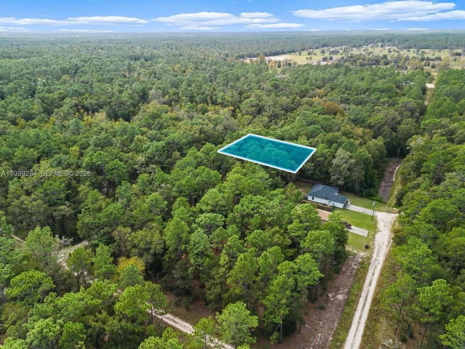 An aerial view shows a wooded lot with a highlighted rectangular area near a house — 0 SW 30th ST, Ocala FL 34481, OCALA, FL