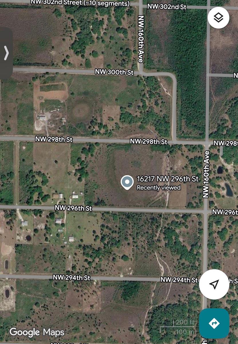 This is a satellite map view of a rural area with intersecting streets and vegetation — 16217 NW 296th Street, Okeechobee FL 34972, OKEECHOBEE, FL