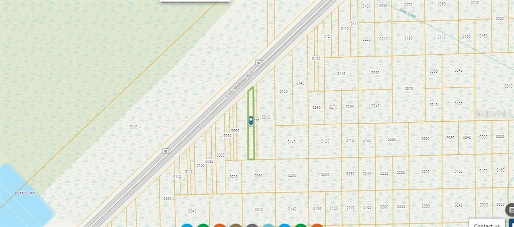 This is a map showing a specific parcel of land highlighted in green along a highway — TURKEY ROOST RD, DELAND, FL