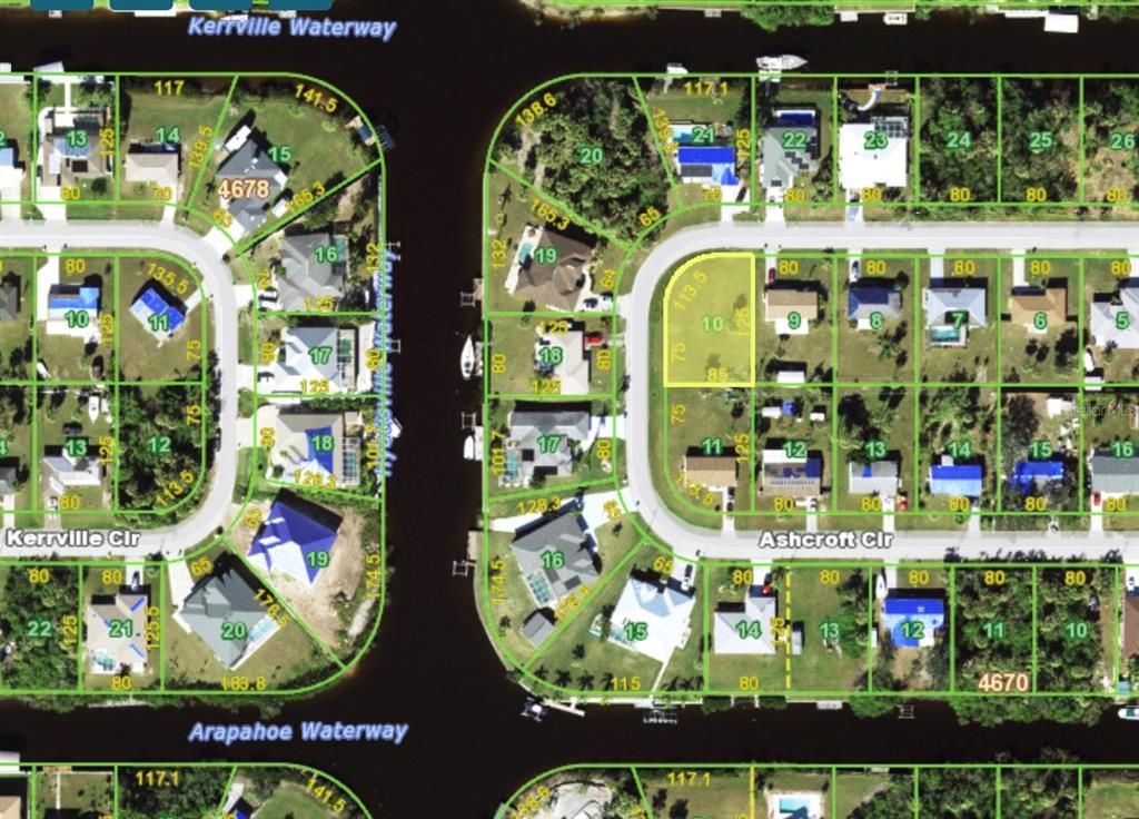 This is a satellite map showing residential lots and waterways in a suburban neighborhood — 18599 ASHCROFT CIRCLE, PORT CHARLOTTE, FL