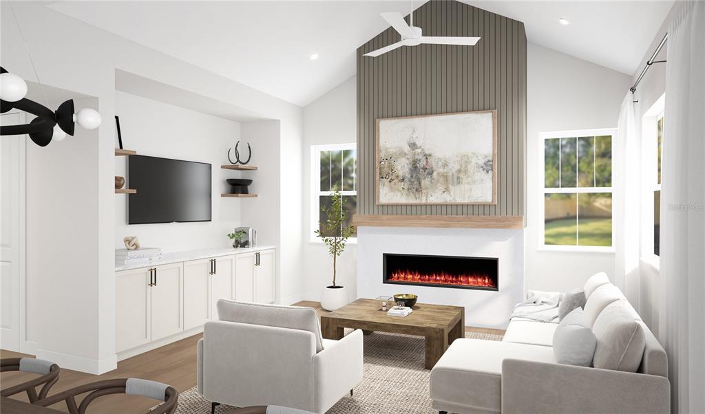 This rendering shows a modern living room with a fireplace, built-in cabinetry, and vaulted ceilings — 3706 W CLEVELAND STREET, TAMPA, FL
