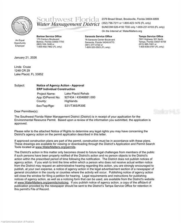 This is a formal letter from the Southwest Florida Water Management District regarding permit approval — DAL HALL, LAKE PLACID, FL