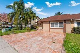 A single-story house with a brown roof and a stamped concrete driveway — 7821 SW 148th Ave # 2, Miami FL 33193, MIAMI, FL