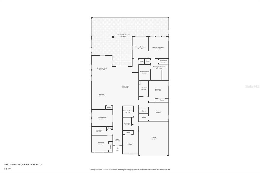 An open-concept kitchen with a white island overlooks a living room and dining area — 5640 TREVESTA PLACE, PALMETTO, FL