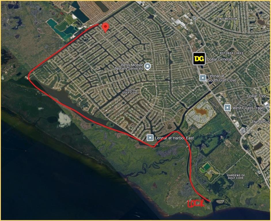 This is a satellite map showing a residential neighborhood in South Gulf Cove, Florida — 14315 MONTMARTE AVENUE, PORT CHARLOTTE, FL