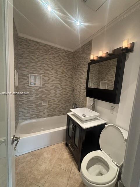 A bathroom features a bathtub with tiled walls, a dark vanity with a vessel sink, and a toilet — 14590 NW 10th Ave, Miami FL 33168, MIAMI, FL