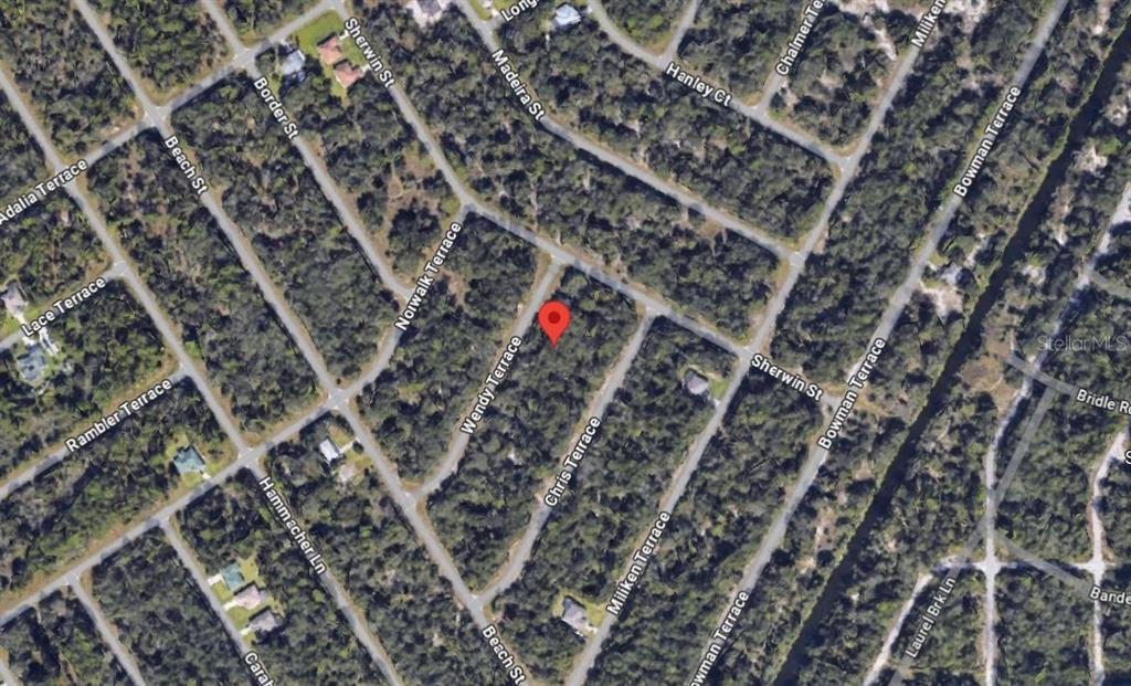 This is an aerial map view of a wooded residential area with marked streets — 1236 WENDY TERRACE, PORT CHARLOTTE, FL