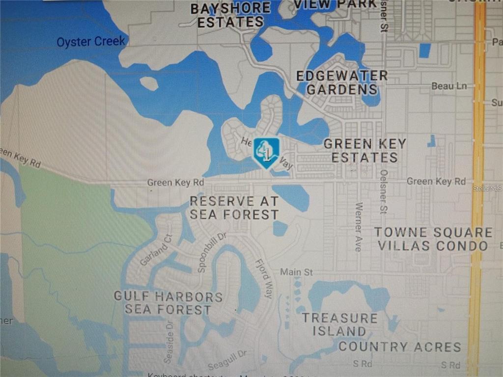 This is a map showing the residential neighborhoods and waterways of a coastal area — 1-2 GREEN KEY, NEW PORT RICHEY, FL