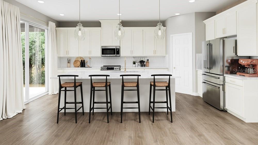 This is a virtually staged rendering of a modern kitchen with a white island and stools — 12813 DOCKYARD TRAIL, PALMETTO, FL