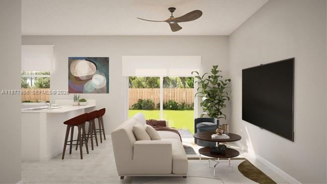 This rendering shows a modern kitchen with white cabinets, stainless steel appliances, and a breakfast bar — 12517 NW 23rd Pl, Miami FL 33167, MIAMI, FL