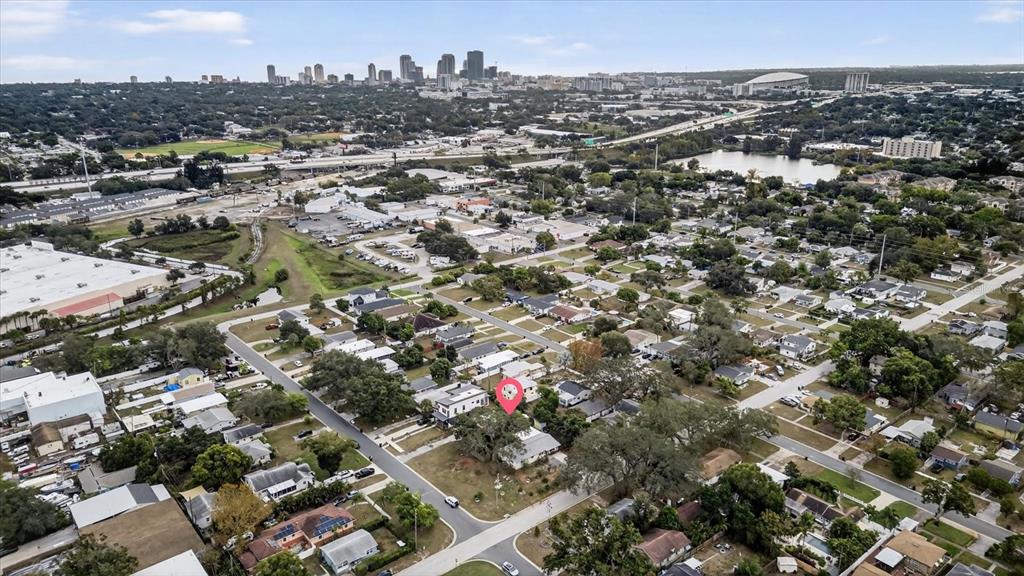 An aerial view shows a residential neighborhood with a pink location pin on a house — 2480 18TH AVENUE N, ST PETERSBURG, FL