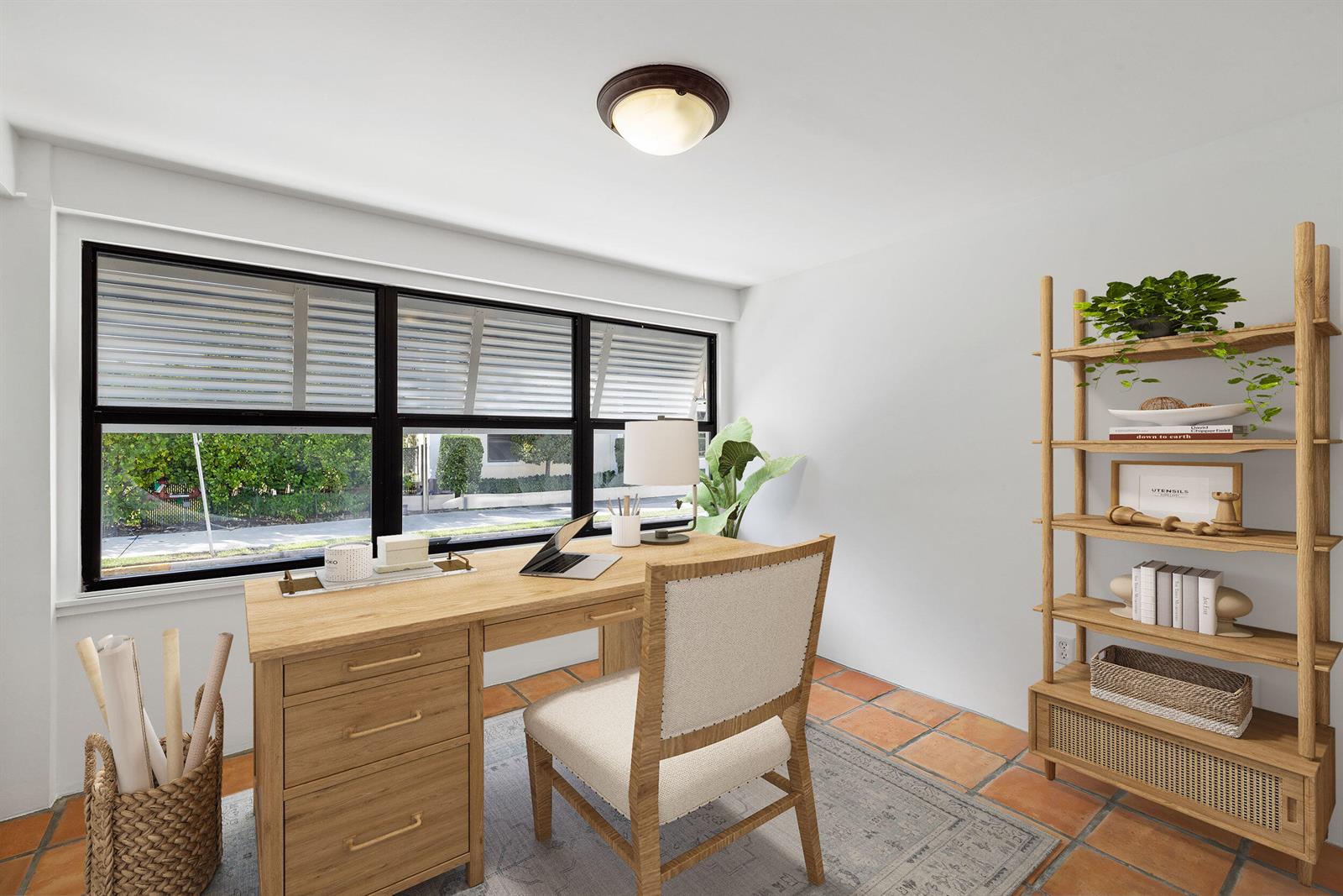 A home office features a wooden desk, a chair, a bookshelf, and tile flooring — 269 Park Avenue, Palm Beach FL 33480, PALM BEACH, FL