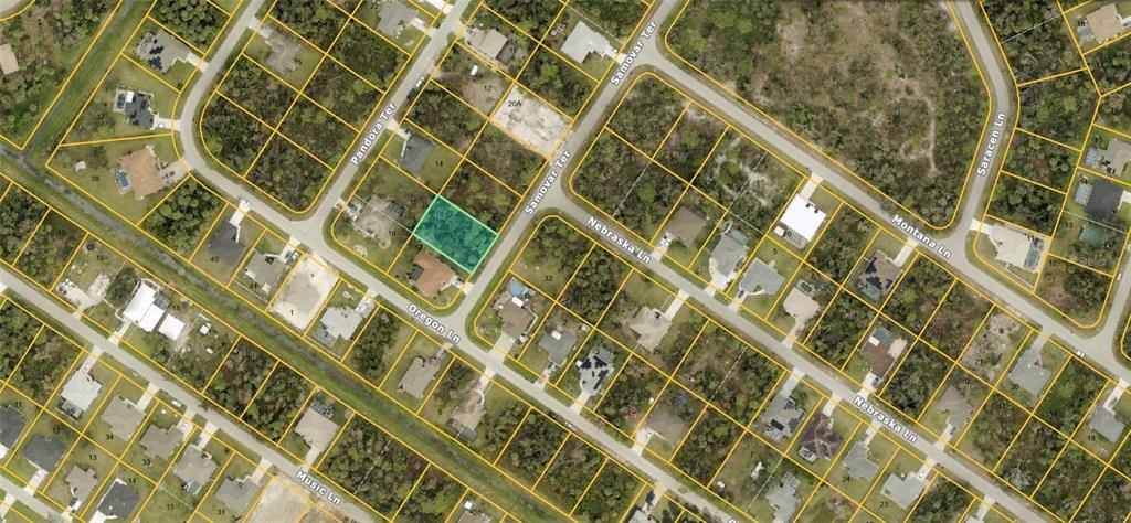 This is an aerial map showing a highlighted vacant lot located at a street intersection — SAMOVAR TERRACE, NORTH PORT, FL