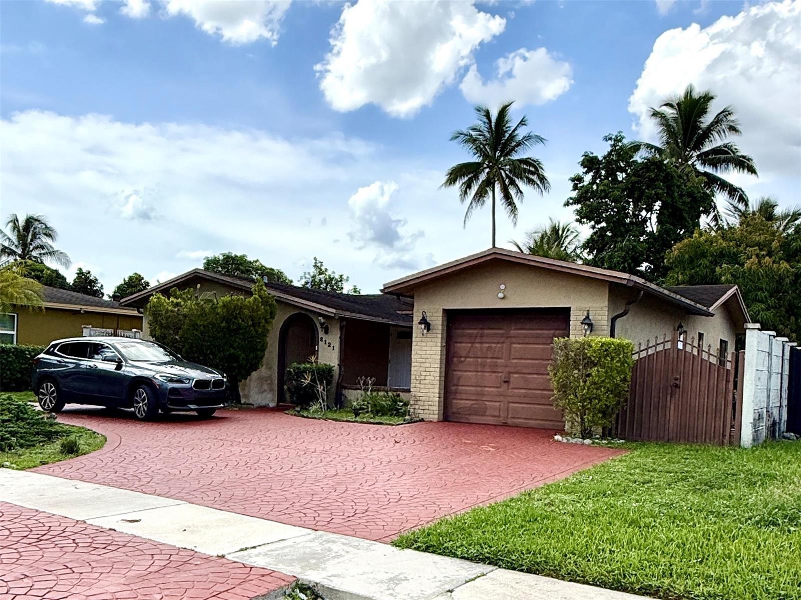 8121 SW 8th Street, North Lauderdale FL 33068