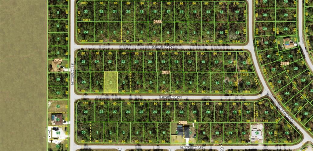 This is a map showing a residential subdivision with highlighted land parcels and street names — 12038 ESCUDE, PORT CHARLOTTE, FL