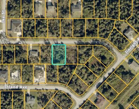 This is an aerial map showing a vacant residential lot outlined in blue — HENNING STREET, NORTH PORT, FL