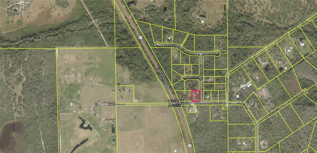 This is an aerial map showing a highlighted property parcel near a highway intersection — 1045 NW 364TH ROAD, OKEECHOBEE, FL