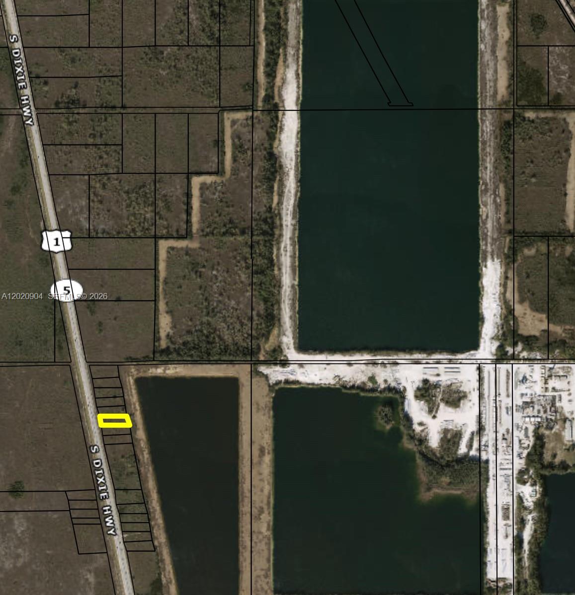 This is an aerial map showing a rectangular parcel of land highlighted in yellow — US1, Florida City FL 33034, FLORIDA CITY, FL