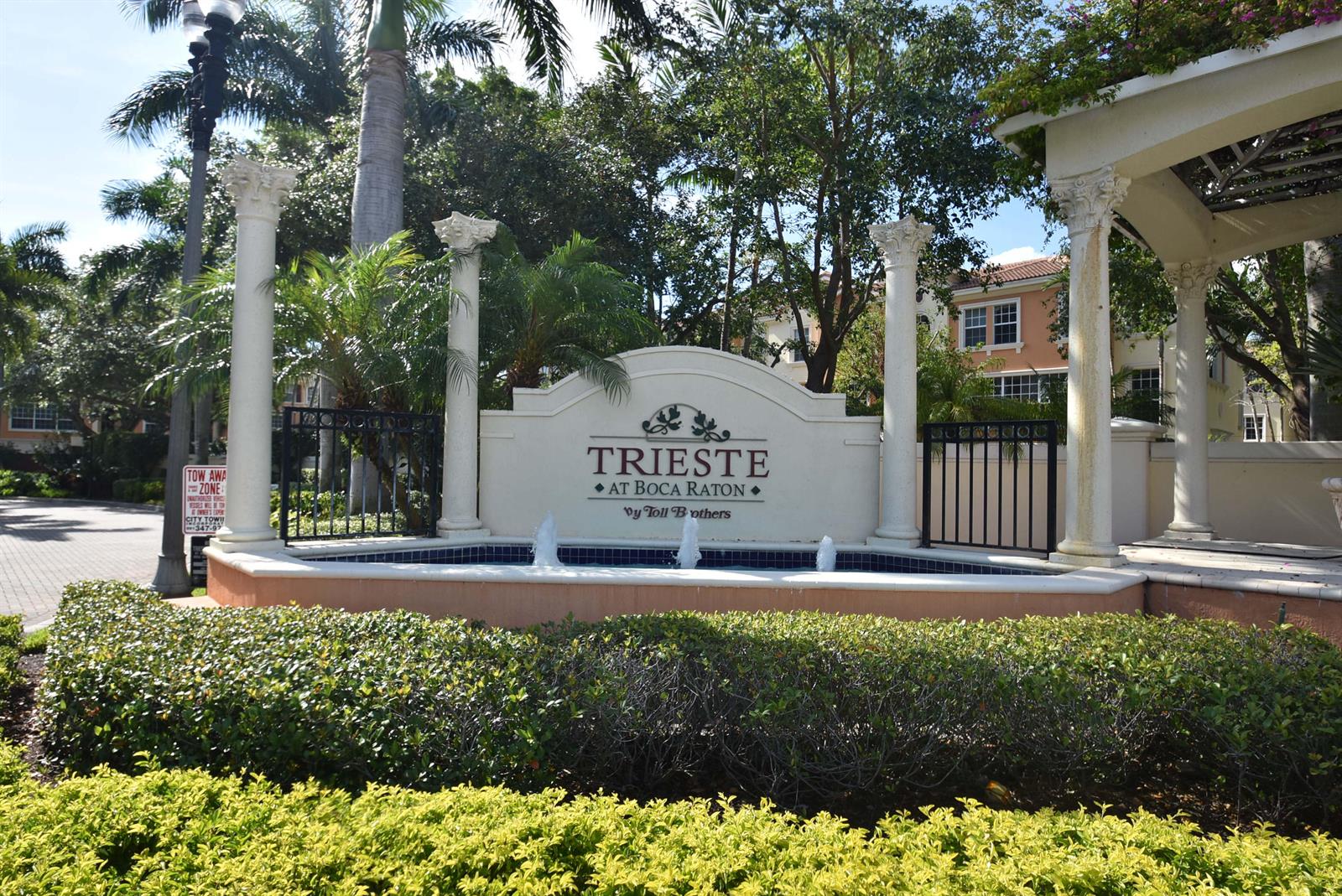 A stone entrance sign for Trieste at Boca Raton features a fountain and columns — 5645 NE Trieste Way, Boca Raton FL 33487, BOCA RATON, FL